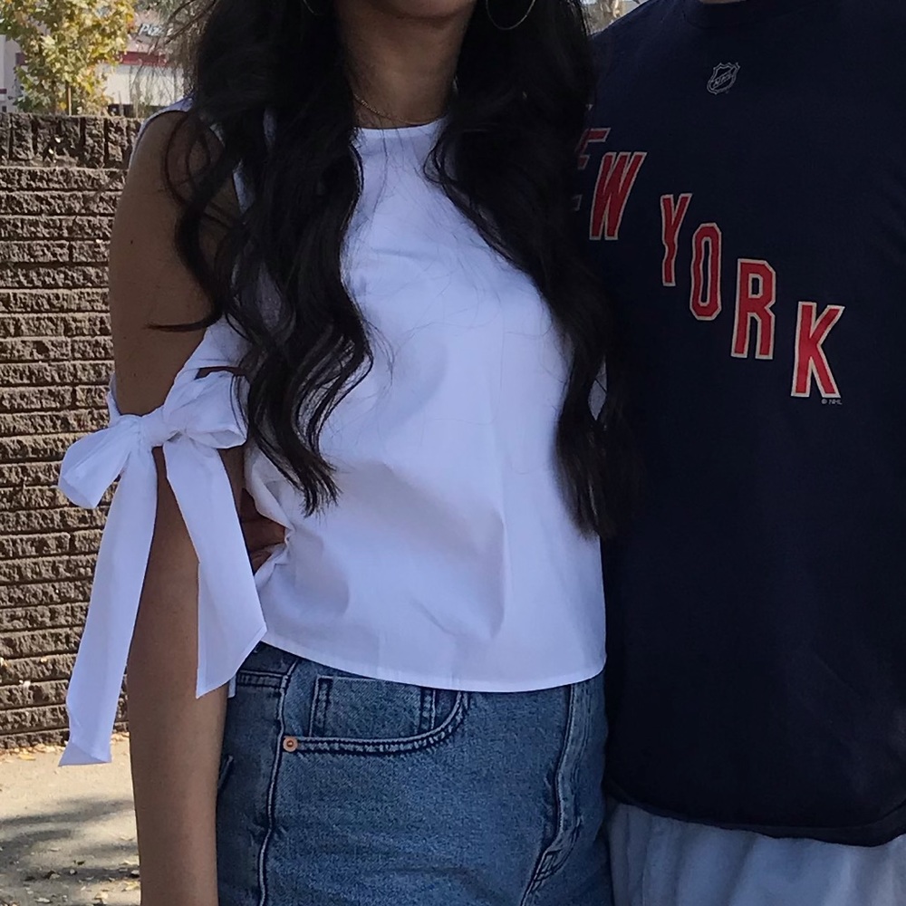 Whit bow sleeve detail blouse